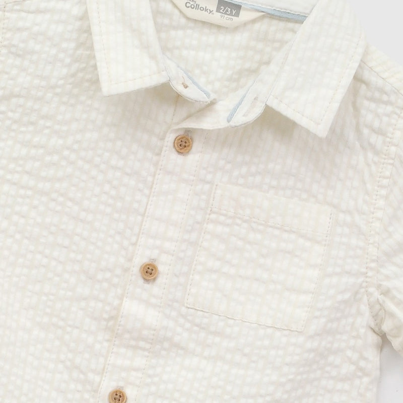 Camisa manga corta niño amarillo 6-9M a 4-5A