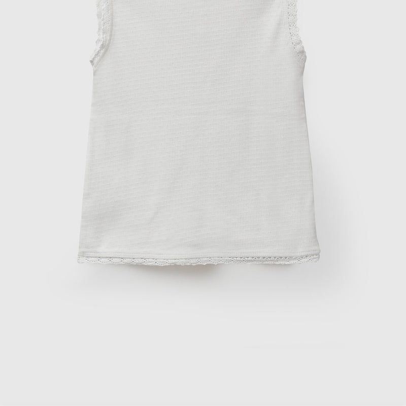 Polera sin mangas niña crema 6-9M a 4-5A