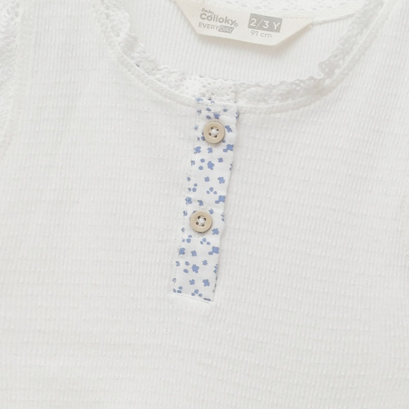 Polera sin mangas niña crema 6-9M a 4-5A