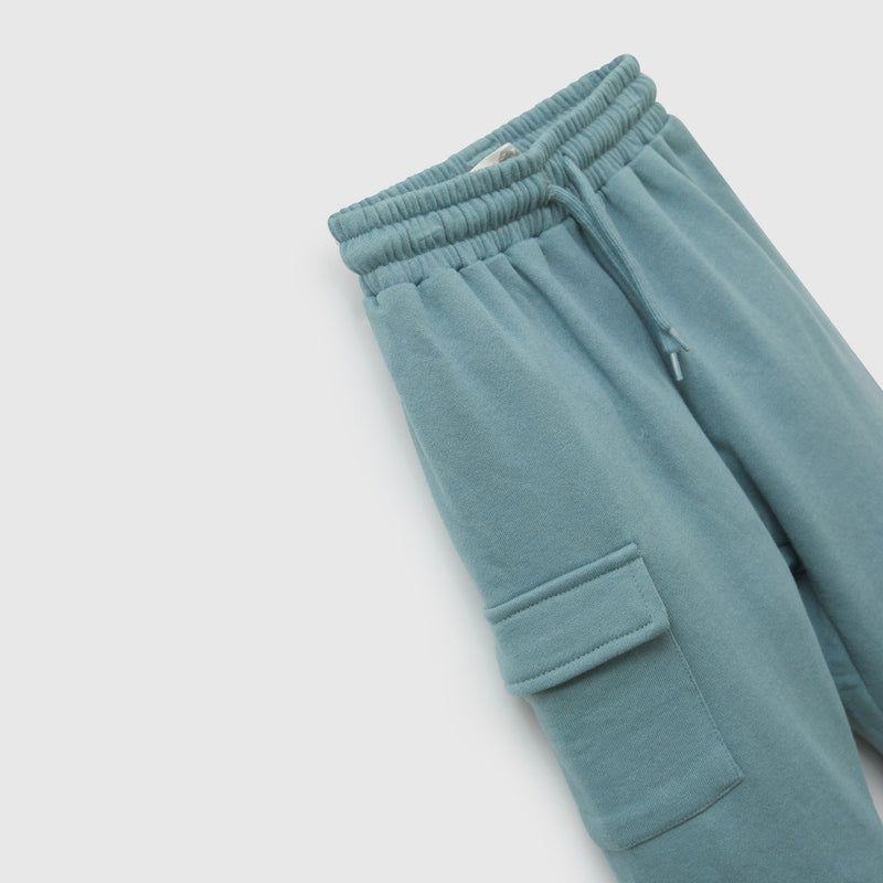 Pantalon buzo bolsillo niño verde 6-9M a 4-5A