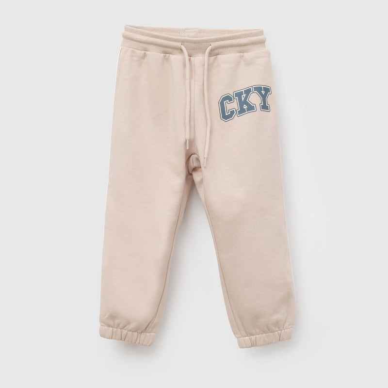 Pantalon buzo cky niño beige 6-9M a 4-5A