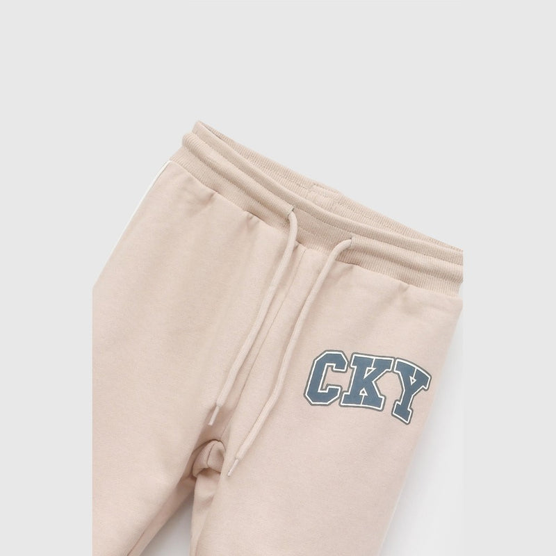Pantalon buzo cky niño beige 6-9M a 4-5A