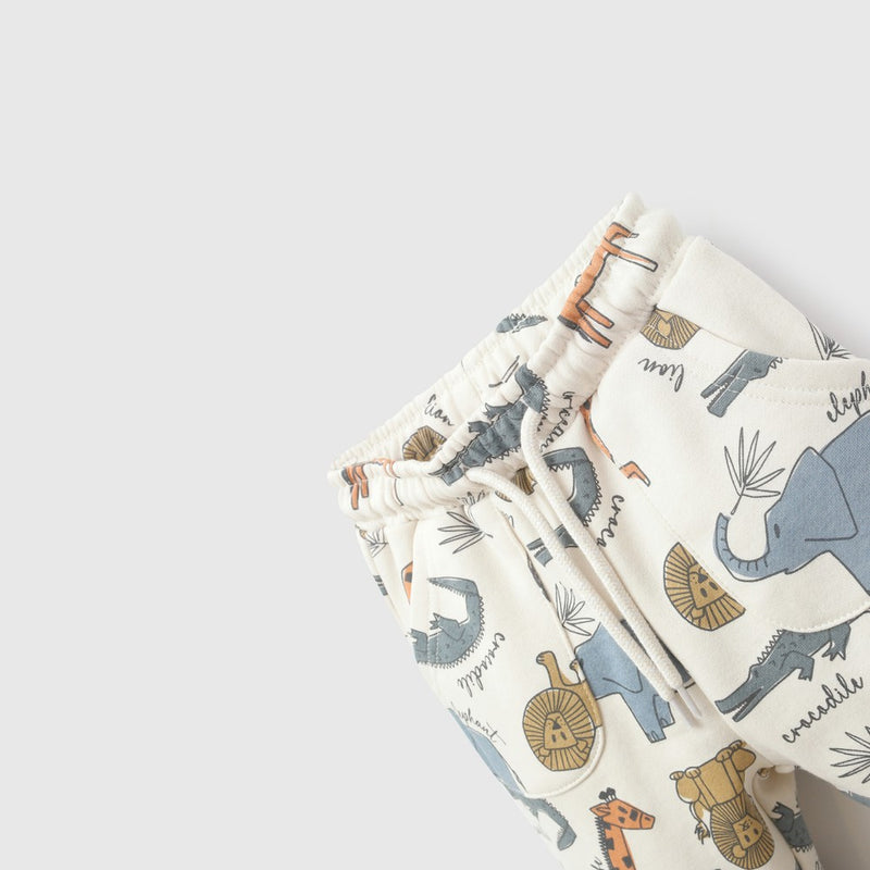 Pantalon buzo animales niño beige 6-9M a 4-5A